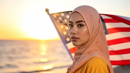 Proud Muslim American woman in a hijab holding the flag of the United States at a beach during a golden sunset - Powered by Adobe