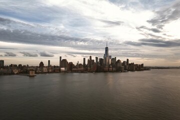Fototapeta premium New York skyline landmarks skyscrapers. Travel to America. New York USA. View of Manhattan in New York. New York City USA midtown Manhattan financial district skyline. NYC from drone. NYC aerial view.