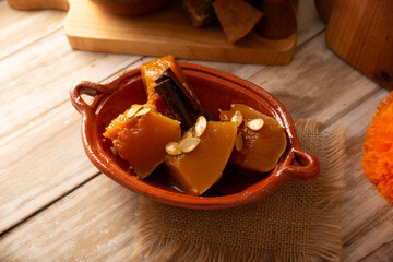 Calabaza en Tacha. Spiced Candied Pumpkin. Mexican dessert whose main ingredients are pumpkin and piloncillo, also known as Chacualole or Dulce de Calabaza, widely used in Day of the Dead offerings.