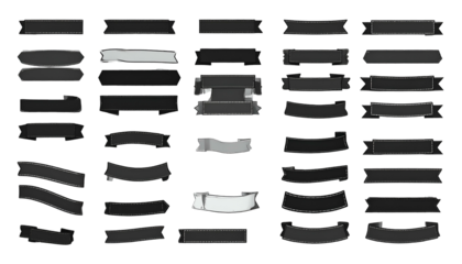 Assortment of monochrome, stylized ribbons in various shapes and designs on black backdrop