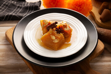 Calabaza en Tacha. Spiced Candied Pumpkin. Mexican dessert whose main ingredients are pumpkin and piloncillo, also known as Chacualole or Dulce de Calabaza, widely used in Day of the Dead offerings.