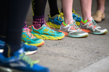 A low shut of multiple pairs of running shoes - horizontal