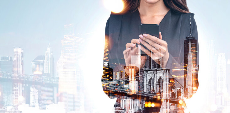 Businesswoman holding phone, merged with city buildings in double exposure style, on a light background. Concept of digital communication and urban life