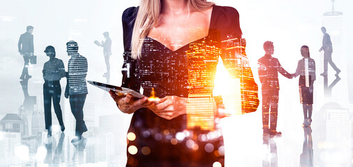 Businesswoman holding tablet with overlay of cityscape and silhouettes of people interacting, on...