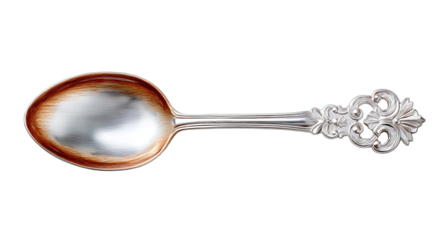 Elegant Silver Spoon With Intricate Handle Detail Isolated On Black Background Studio Shot