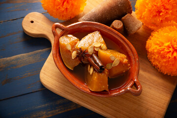 Calabaza en Tacha. Spiced Candied Pumpkin. Mexican dessert whose main ingredients are pumpkin and piloncillo, also known as Chacualole or Dulce de Calabaza, widely used in Day of the Dead offerings.