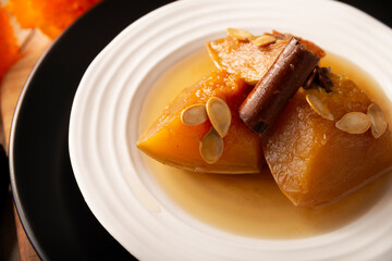 Calabaza en Tacha. Spiced Candied Pumpkin. Mexican dessert whose main ingredients are pumpkin and piloncillo, also known as Chacualole or Dulce de Calabaza, widely used in Day of the Dead offerings.
