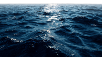 Deep blue ocean waves with sunlight glistening on the water's surface create a textured atmospheric seascape isolate