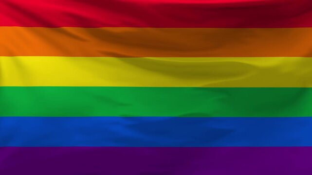 The Lgbt flag is waving in the wind.