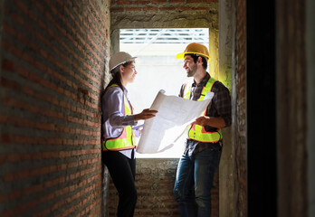 Architects and engineers discuss teamwork, construction, and happiness for real estate, complete with plans, inspections, and hard hats at the construction site.