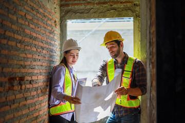 Architects and engineers discuss teamwork, construction, and happiness for real estate, complete with plans, inspections, and hard hats at the construction site.