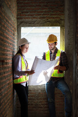 Architects and engineers discuss teamwork, construction, and happiness for real estate, complete with plans, inspections, and hard hats at the construction site.