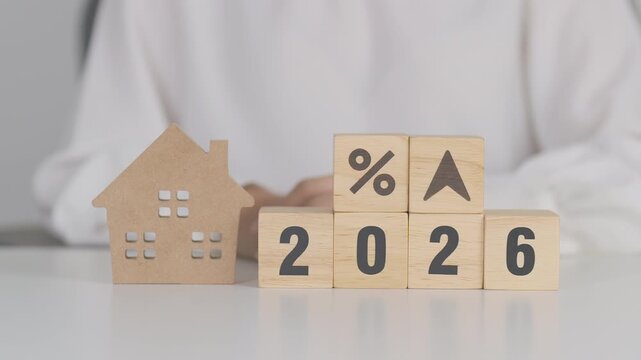 2026 New Year with percentage change to UP and Down arrow with Home model. Real estate Mortgage, Refinance, House loan and debt, Interest rate, Insurance, Financial and Property Tax