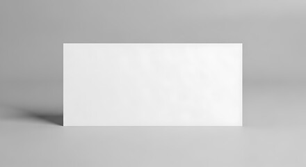 Minimalist design template: a crisp white card casting a floating shadow on a uniform surface