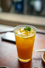 Refreshing iced tea served in a glass with garnish.
