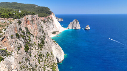 Aerial drone photo from scenic viewpoint to small iconic islets of Mizithres a true paradise tourist place visited by yachts and sail boats in island of Zakinthos, Ionian Sea, Greece