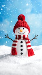 Obraz premium Snowman in red hat and scarf, snow