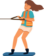 Young woman wakeboarding, holding a tow rope and enjoying extreme water sport activity