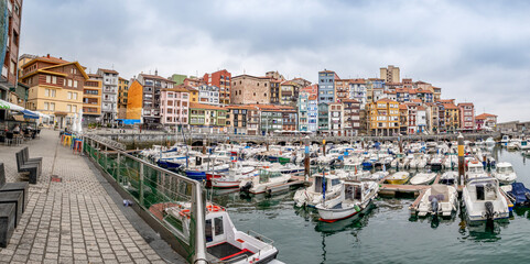 Fototapeta premium Traditional Colorful Buildings and Fishing Port and Waterfront, Panoramic View in Bermeo, Basque Country