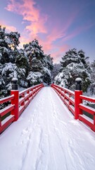 Snowy red bridge at dawn