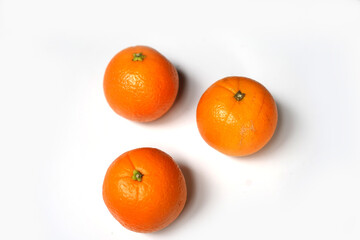 Fresh Three Oranges Isolated on White Background.