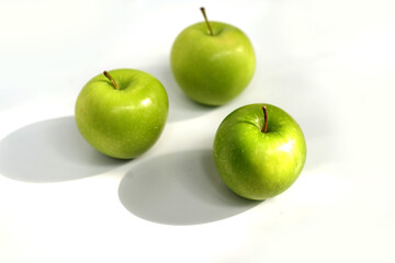 Fresh Three green apples Isolated on White Background.