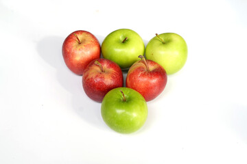 Triangle Arrangement of Red and Green Apples Isolated on White Background.