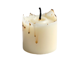 Close-up of a partially burned candle with a black wick and wax drips