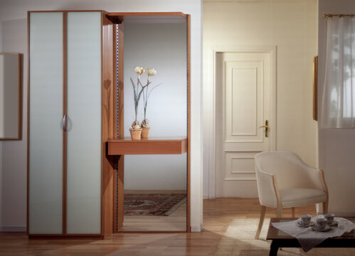 Single shot photo of a room with a mirror