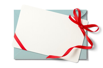 リボンを結んだカードと水色の封筒