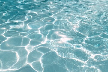 Sunlit water surface pool reflections ripples.