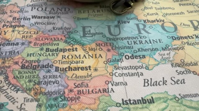 Discovering the map of Europe with an old compass.