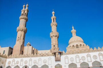 Obraz premium Egypt antiquities, Al-Azhar Mosque in historic Islamic core of the city. Commissioned as the new capital of the Fatimid Caliphate, dome, minaret, selective focus, shallow depth of field, Cairo Egypt 