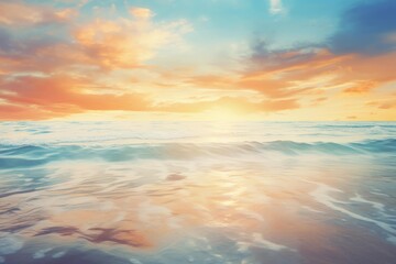 Obraz premium Golden sunset reflecting on calm ocean waves creating a beautiful seascape
