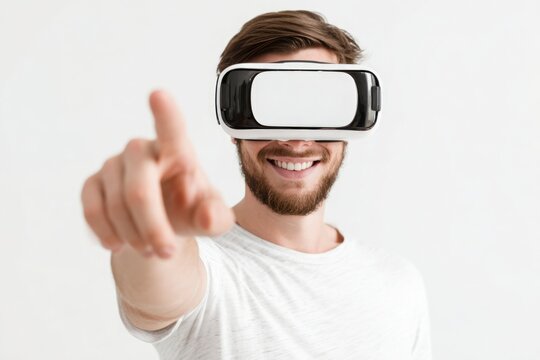 Young man engages with virtual world using reality spacial computer headset, - Powered by Adobe