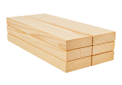 Isolated stack of four wooden planks or boards for carpentry or home improvement projects