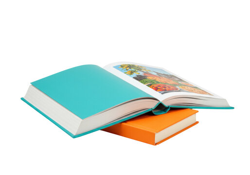 Isolated Books stacked one on top of another, books in colorful teal and orange covers