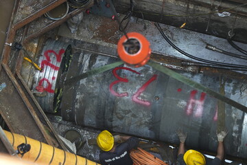 project work on the highway for drilling in the ground, installing large pipes, culverts