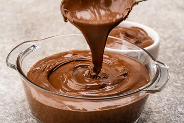 Cream chocolate in a bowl on a vintage background
