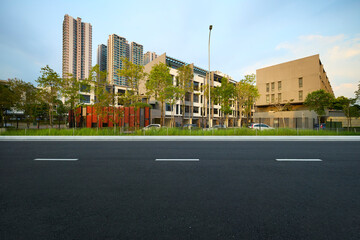 Asphalt road in modern urban residential area