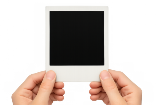 Hands holding blank instant film frame, inserting your memory, retro photography concept with copy space
