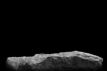 Stone podium on dark black background.