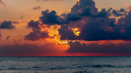 A beautiful sunset at sea. Landscape of a red sunset at sea.