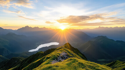 Obraz premium Majestic sunrise over serene mountain landscape with vibrant colors and calm lake