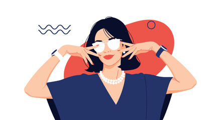 Woman with glasses poses looking at the camera fashion style.