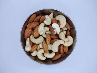 Healthy Mix of Almonds and Cashews in a Steel Bowl