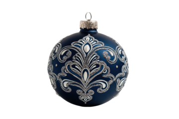 Ornate navy blue Christmas ornament with silver and white decorative swirls