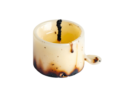 A small, used candle, wax melted with burnt wick and drips, isolated on black
