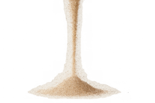 Pouring sand stream forming a pile, representing time passing, isolated on a transparent background
