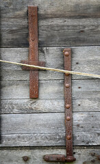 Closeup of rusty iron metalwork on vintage wooden box